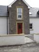 Window and door surrounds with date stone